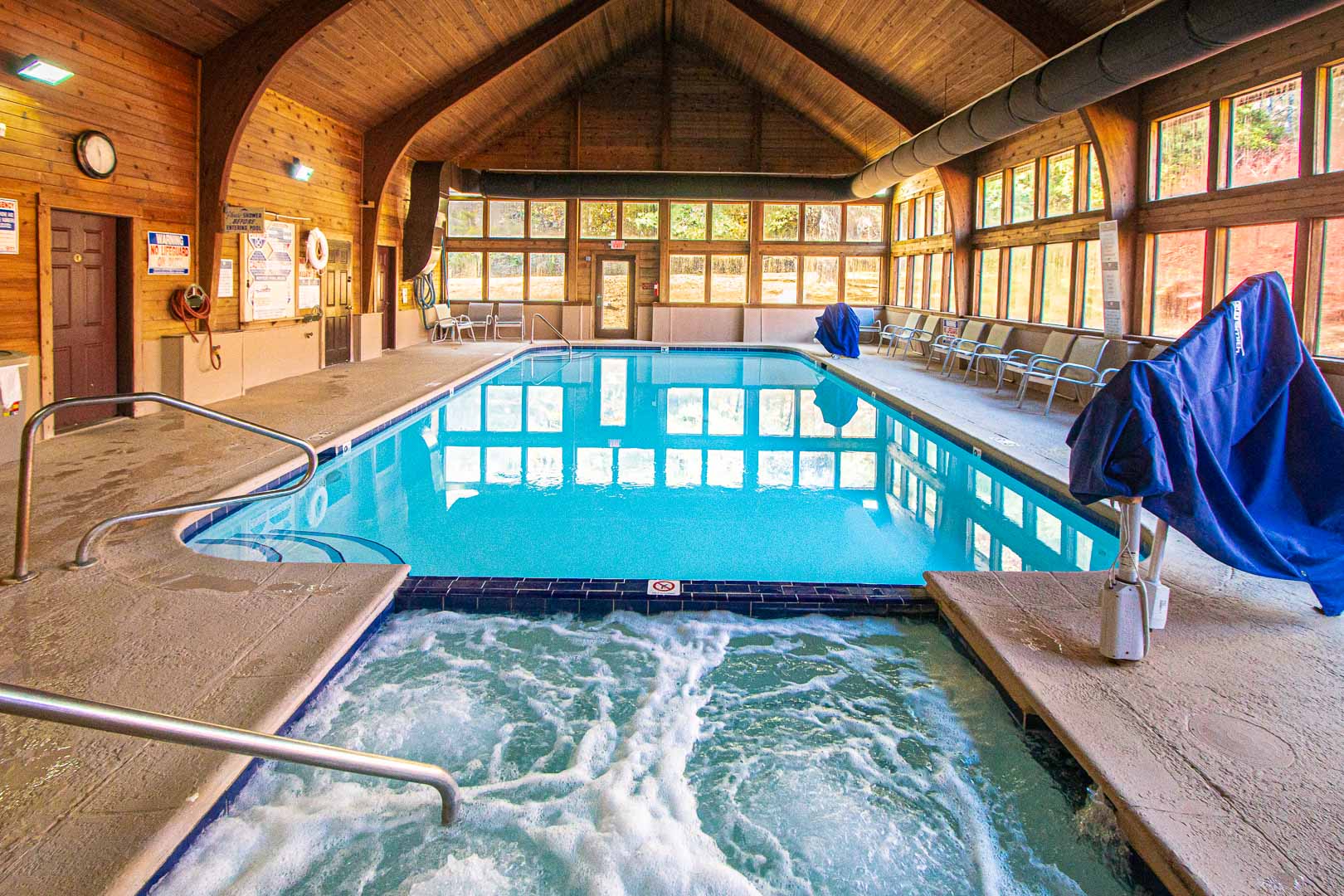 A quaint indoor swimming pool and Jacuzzi tub at VRI's Fox Run Resort in North Carolina.